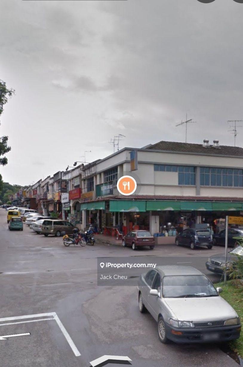 Shop lot and bus stop nearby.