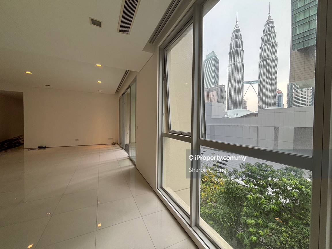 Overseeing Twin Towers with Spacious Living Room