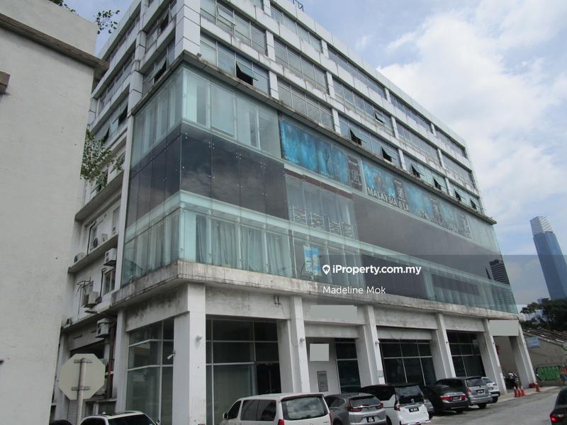 Office building with front lobby parking