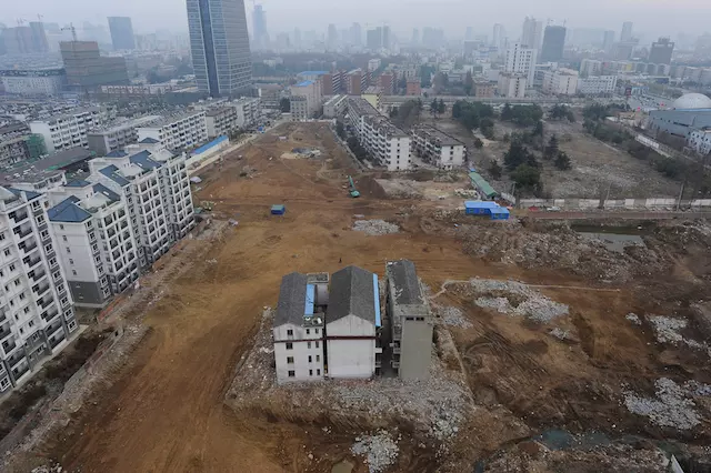 A "nail house", the last building in the area, is seen at a construction site which will be developed as a new apartment zone in Hefei